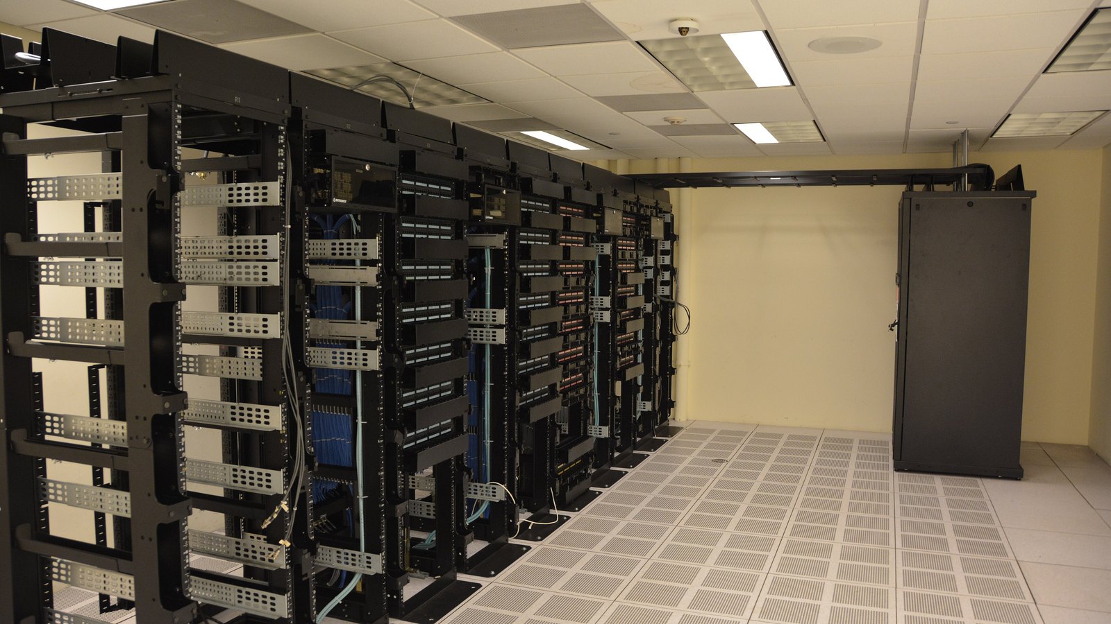 Empty server racks in a data center room