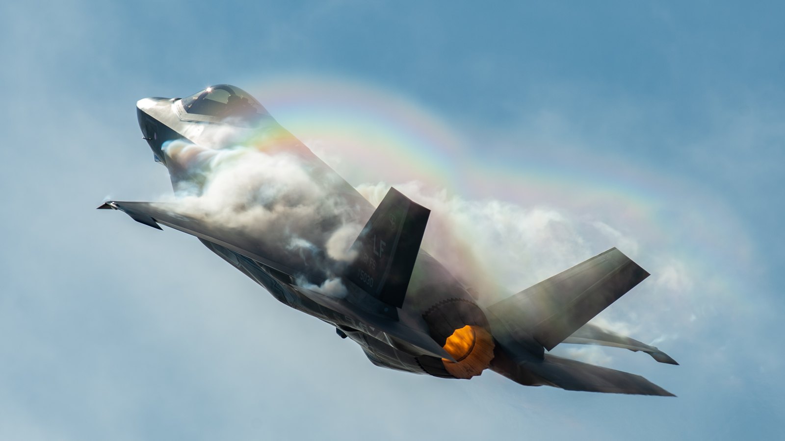F-35 Lightning II fighter jets flying in formation at an air show